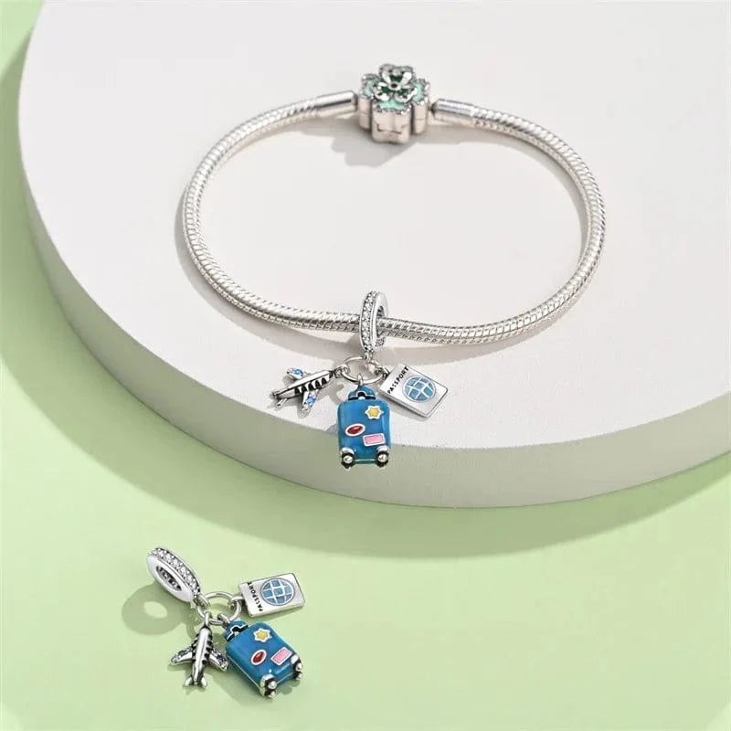 Plane, Passport and Blue Suitcase Triple Dangle Charm